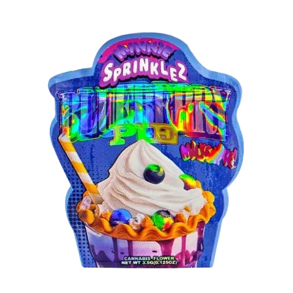 A packaged novelty candy product labeled 'Minnie Sprinklez' and 'Berry Blast,' showing a cupcake topped with whipped cream and a blueberry, on a blue die-cut backing card with holographic lettering.